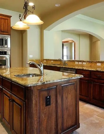 Sink with wooden cabinets